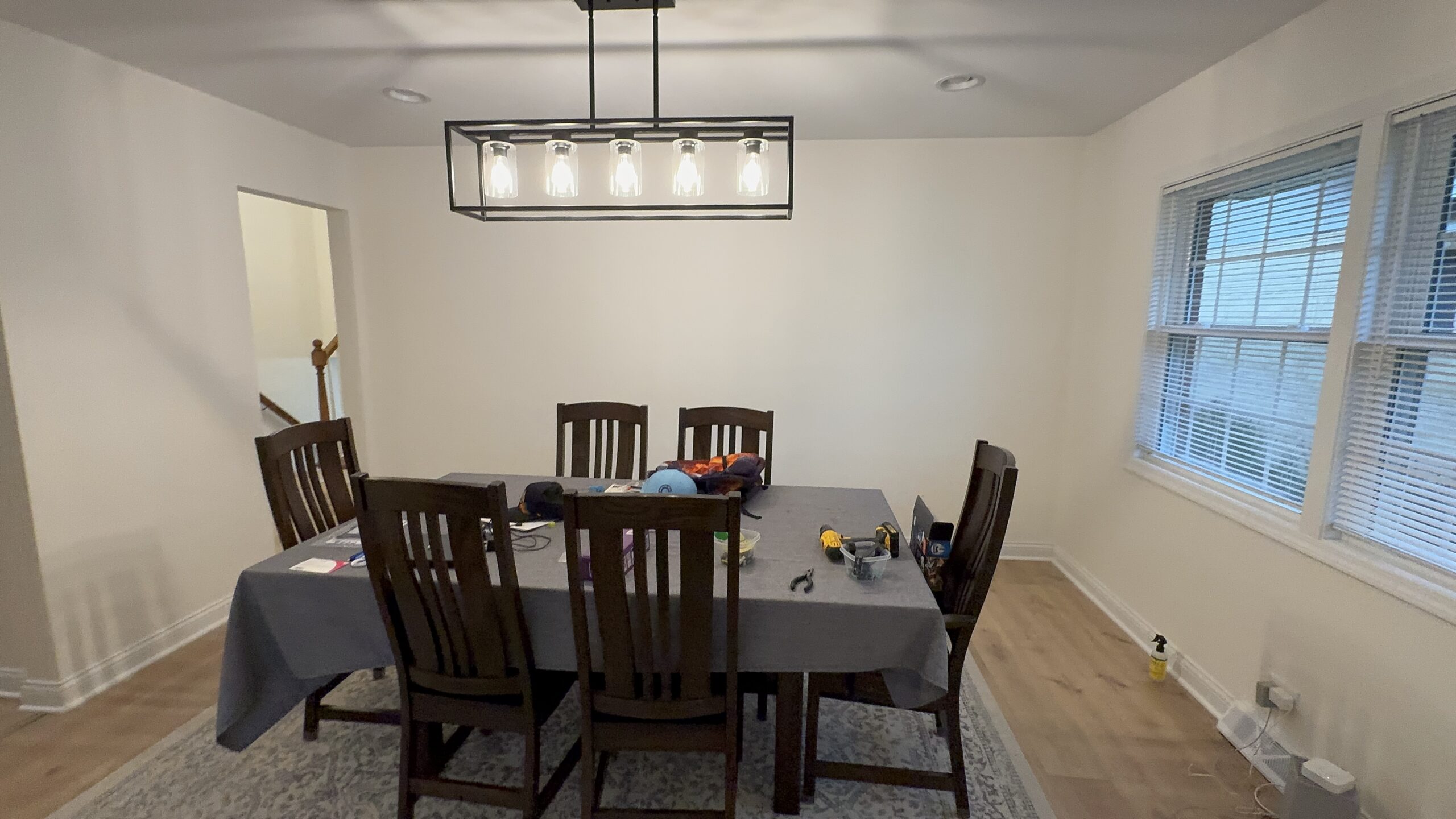 Dining room ceiling and hanging light in an Empire Painters Chicago project